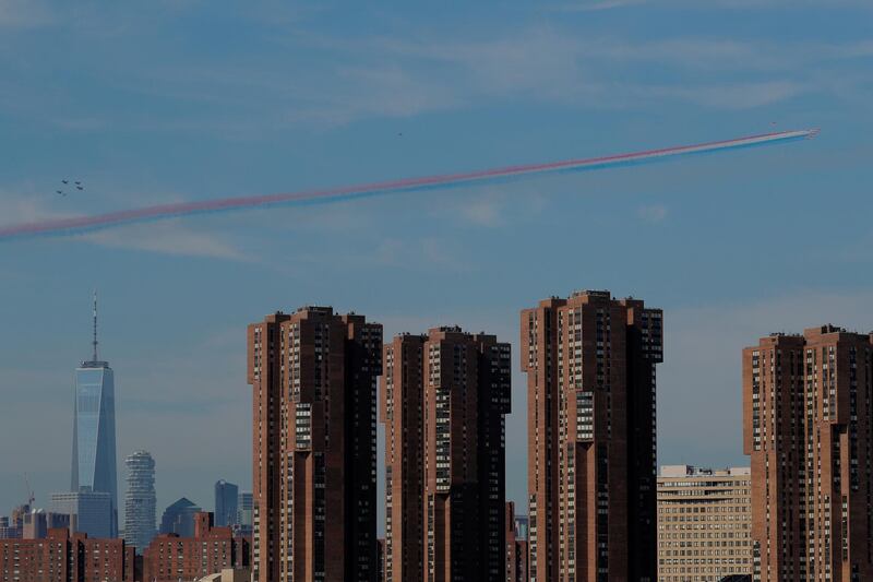 The Royal Air Force Red Arrows from the United Kingdom, U.S. Air Force Thunderbirds and F-35 Lightning II Demo Team fly past the One World Trade building in New York, U.S.  Reuters