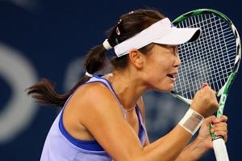 Peng Shuai beats Maria Sharapova to the delight of the home crowd at the Olympic tennis centre.