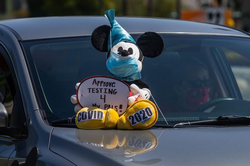 Coalition of resort labor unions representing Disney cast members holds a car caravan around Disneyland Resort calling for higher safety standards before its reopening in Anaheim, California, USA. AFP