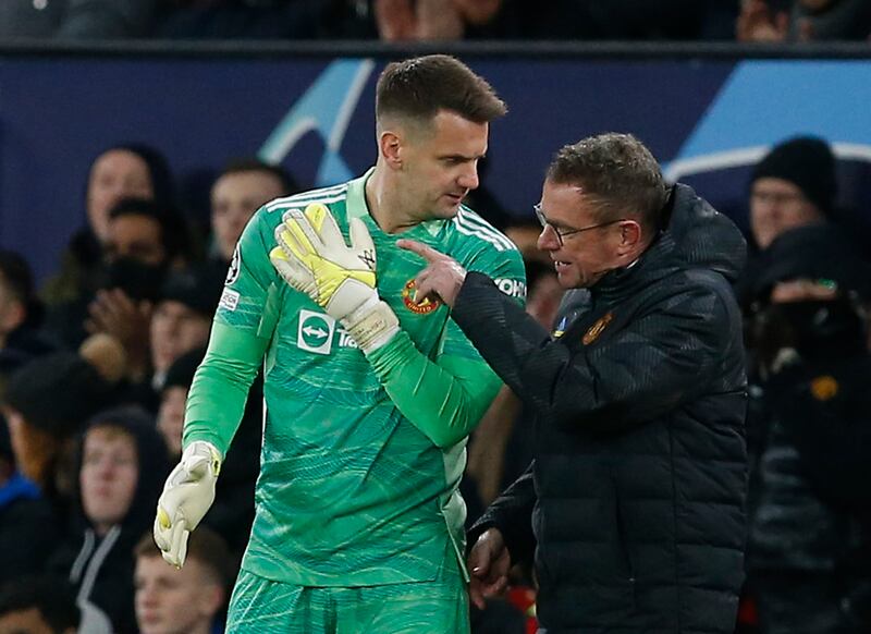 Tom Heaton talks to interim manager Ralf Rangnick before coming on as a substitute in the Champions League match against Young Boys. Reuters