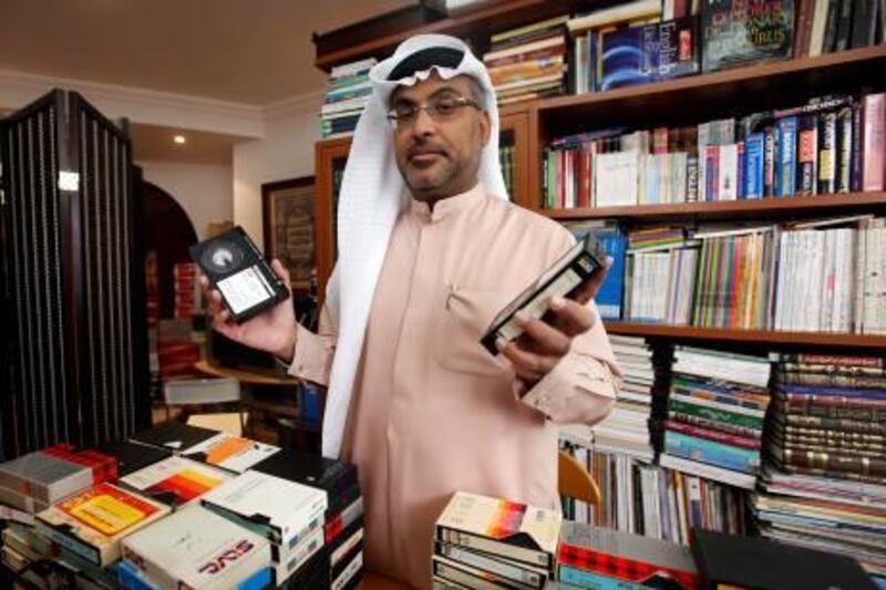 Dubai , United Arab Emirates- April 05, 2011:  Aqeel Al Showab who has been collecting videos, recordings, & Photos since he was 14 years old  pose  during the interview at his residence  in Dubai . ( Satish Kumar / The National )
