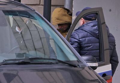 Evan Gershkovich, detained on suspicion of espionage, leaves a court building in Moscow. Reuters 