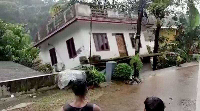 A house is swept away in Kottayam. Reuters