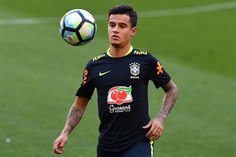 Barcelona are said to be mulling over whether to launch a fourth bid for the Liverpool playmaker Philippe Coutinho, who has handed in a transfer request to try and force his club's hand. Nelson Almeida / AFP
