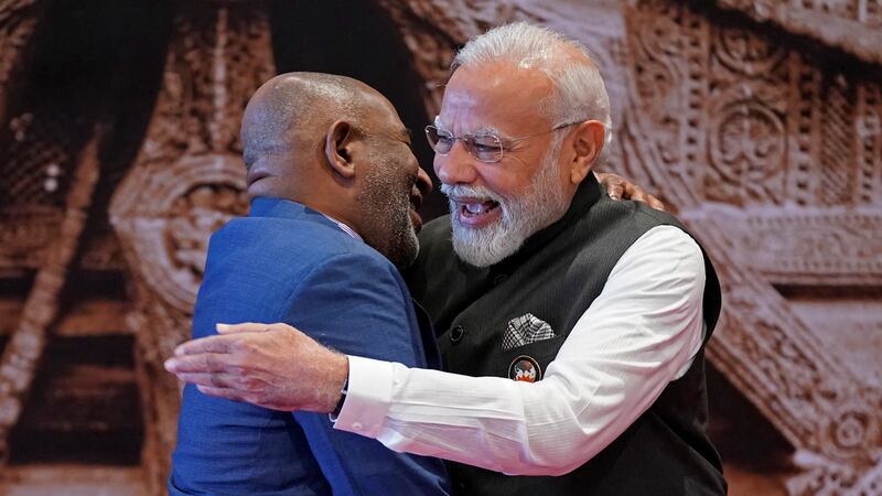 Indian Prime Minister Narendra Modi, right, greets African Union Chairman Azali Assoumani upon his arrival at the G20 summit in New Delhi. The 55-nation bloc has been invited to take part in the G20's next summit. Photo: supplied
