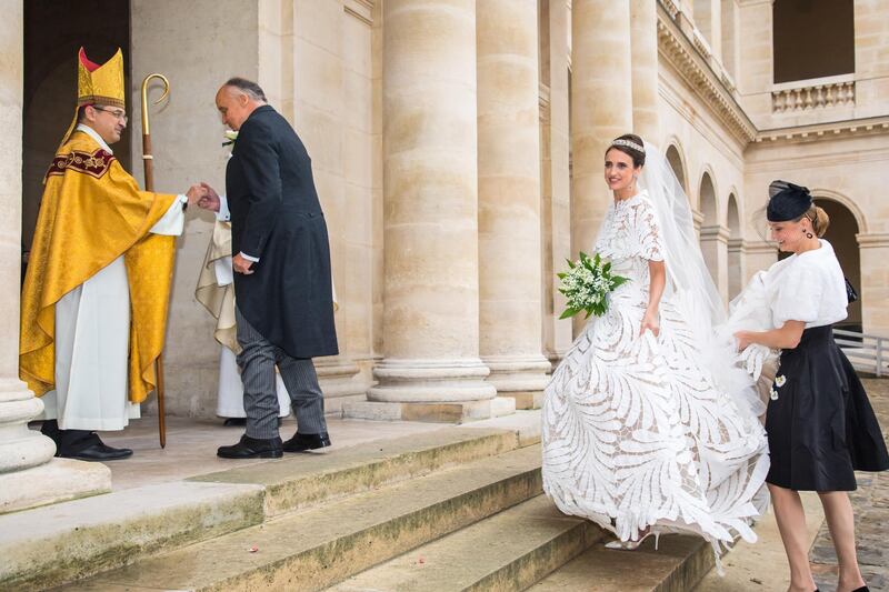 epa07933488 Countess Olympia Arco-Zinneberg (R) arrives with Riprand von und zu Arco-Zunneberg (2-L) prior to her wedding ceremony at the Saint-Louis-des-Invalides cathedral at the Invalides National Hotel  in Paris, France, 19 October 2019.  EPA-EFE/CHRISTOPHE PETIT TESSON