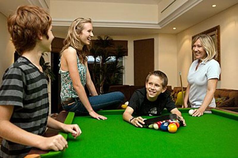 From left: Brody, Delaney, Cutter and Daniele Aarhaus at their family home in the Green Community, Dubai.