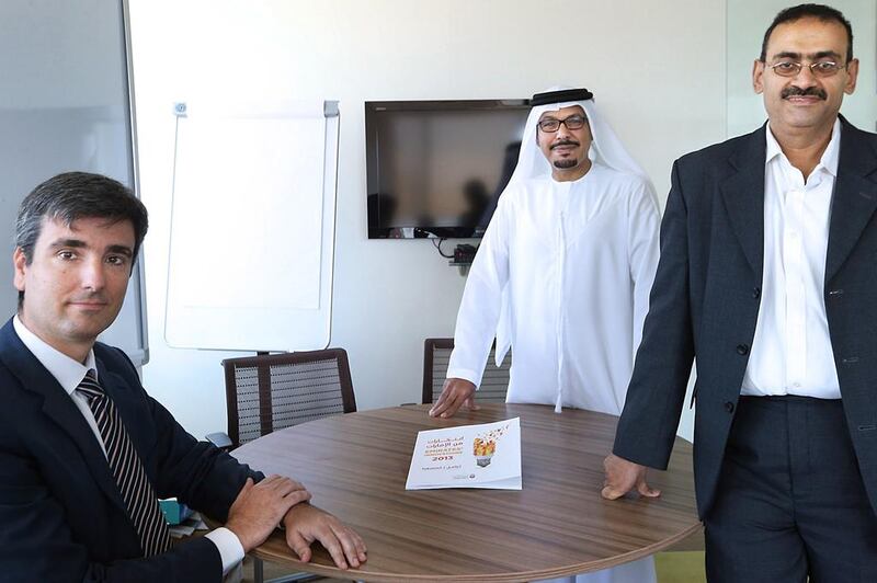 From left: Enrico Villa, the director of enterprise development and innovation at TDC; Omar Al Tamimi, a board member at Green Nanotek; and Professor Yousef Haik, of the Department of Mechanical Engineering at the UAE University. Delores Johnson / The National