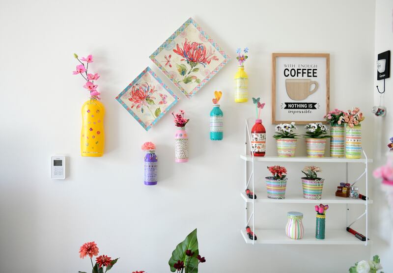 Recycled dishwashing and water bottles also make it to the walls
