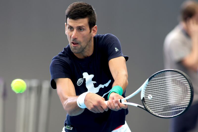 Novak Djokovic plays a backhand return during a practice session in Adelaide. AP