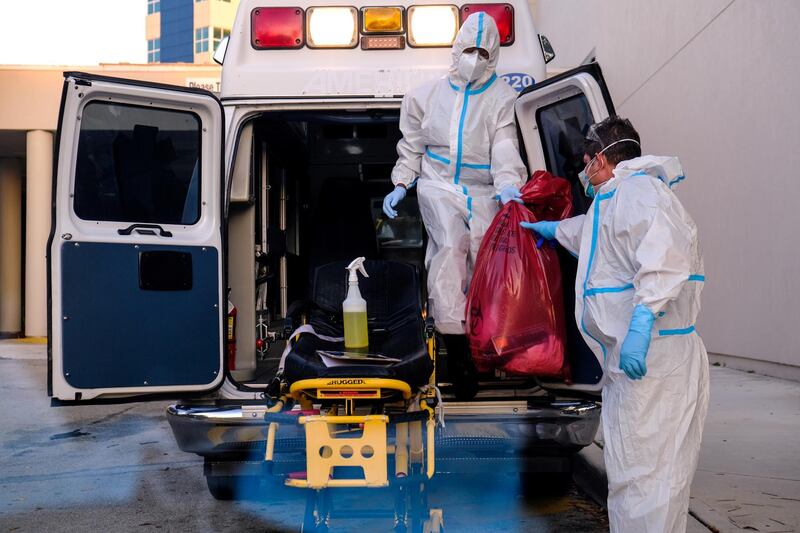 EMT’s cleanse their materials outside Memorial West Hospital where coronavirus disease (COVID-19) patients are treated, in Pembroke Pines, Florida, U.S. REUTERS