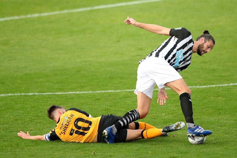 Andy Carroll - 5: Big striker needed more support up front and ended up being dragged out of attacking positions looking for the ball. Never looked like ending his scoring drought. Getty