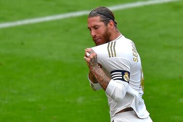 Real Madrid's Spanish defender Sergio Ramos celebrates after scoring a goal during the Spanish League football match between Athletic Club Bilbao and Real Madrid at the San Mames stadium in Bilbao on July 5, 2020. / AFP / Ander GILLENEA