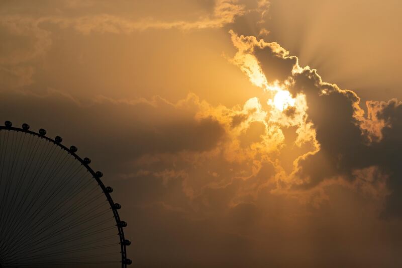 Dubai, United Arab Emirates - Reporter: N/A. News. Weather. The sun sets behind the Ain Dubai big wheel after the rain came down. Sunday, November 8th, 2020. Dubai. Chris Whiteoak / The National