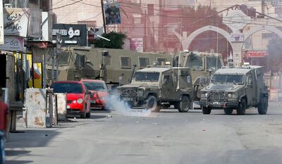 An Israeli operation at Jenin refugee camp in the West Bank on October 8. EPA