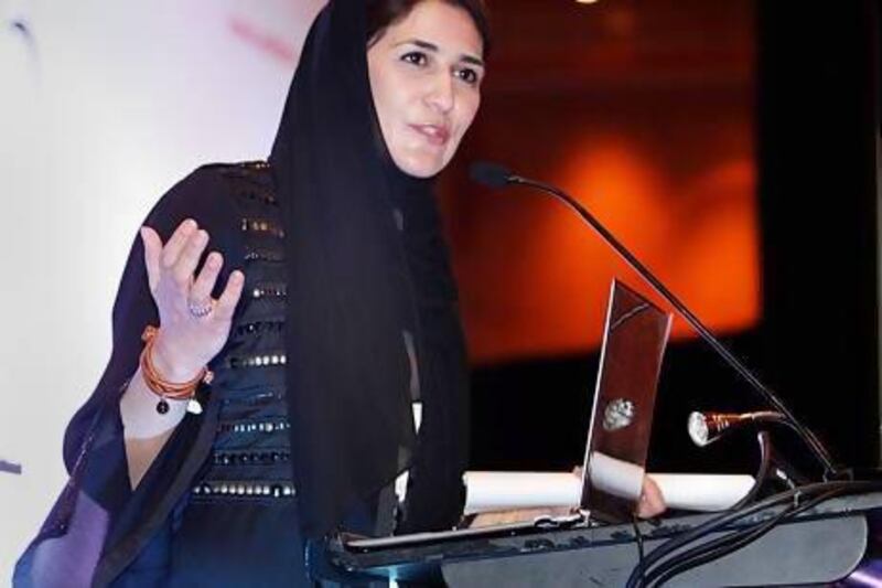 Khuloud Al Nuwais, chief sustainability officer, Emirates Youth Foundation for Youth Development, speaking at the 16th Global Women Leaders Conference in Dubai. Sarah Dea / The National