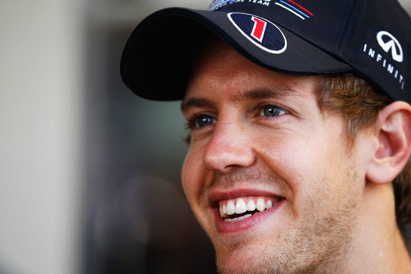 ABU DHABI, UNITED ARAB EMIRATES - NOVEMBER 10:  Sebastian Vettel of Germany and Red Bull Racing is seen in the paddock during previews to the Abu Dhabi Formula One Grand Prix at the Yas Marina Circuit on November 10, 2011 in Abu Dhabi, United Arab Emirates.  (Photo by Paul Gilham/Getty Images) *** Local Caption ***  132047477.jpg