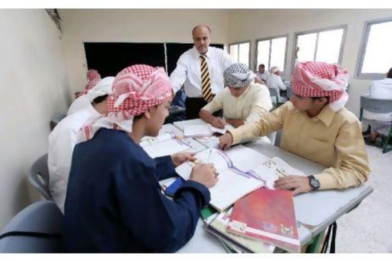 Mahmoud Abdelwhab, a teacher at Al Noaman Bin Basheer Secondary School in Ajman, teaches English to science students.