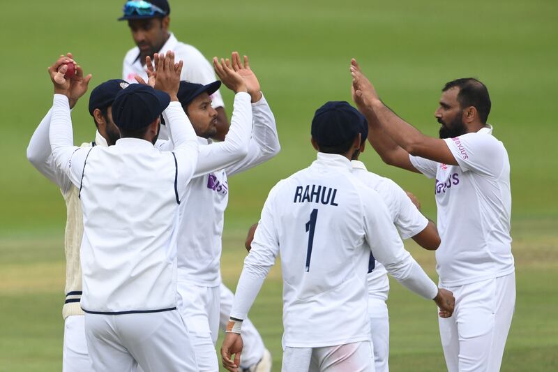 India celebrate the wicket of Rassie van der Dussen at the Wanderers. Getty