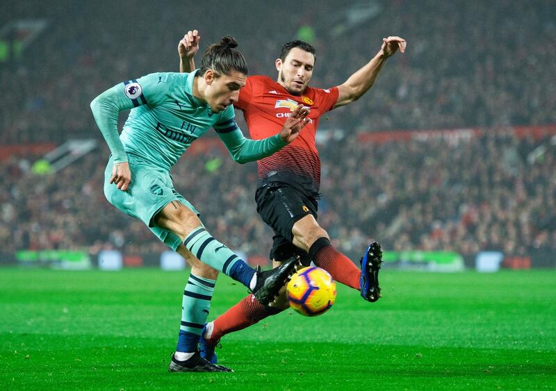 Manchester United's Matteo Darmian, right, in action with Arsenal's Hector Bellerin. EPA
