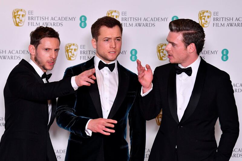 Actors Jamie Bell, Taron Egerton and Richard Madden pose in the winners' room at the British Academy Film Awards 2019. AFP