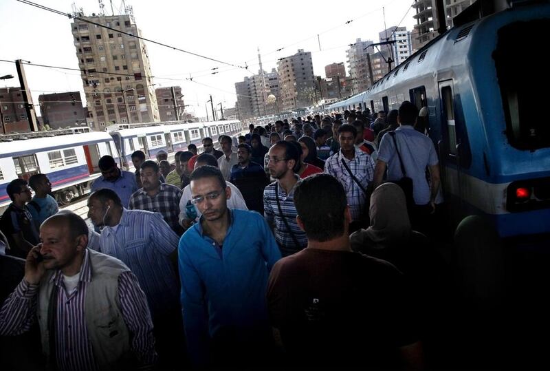 Passengers depart the New Al Marg metro station.