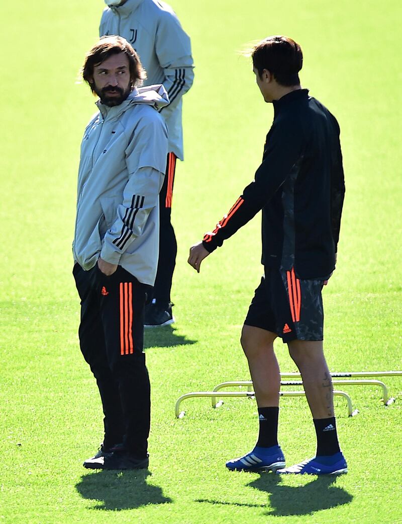 Andrea Pirlo with Paulo Dybal. Reuters