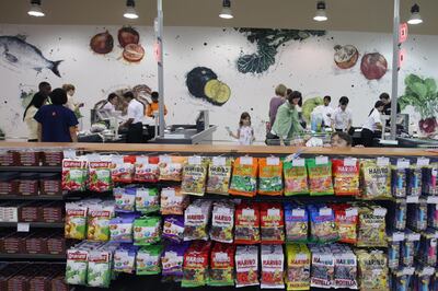 DUBAI, UNITED ARAB EMIRATES - NOVEMBER 8:  People shopping in the recently opened Waitrose supermarket at the Dubai Mall in Dubai on November 8, 2008.  (Randi Sokoloff / The National)  To go with story by James Brennan. *** Local Caption ***  RS004-1108-Waitrose.jpgal12no-jumpMAIN.jpg al12no-jumpMAIN.jpgal12no-jumpMAIN.jpg