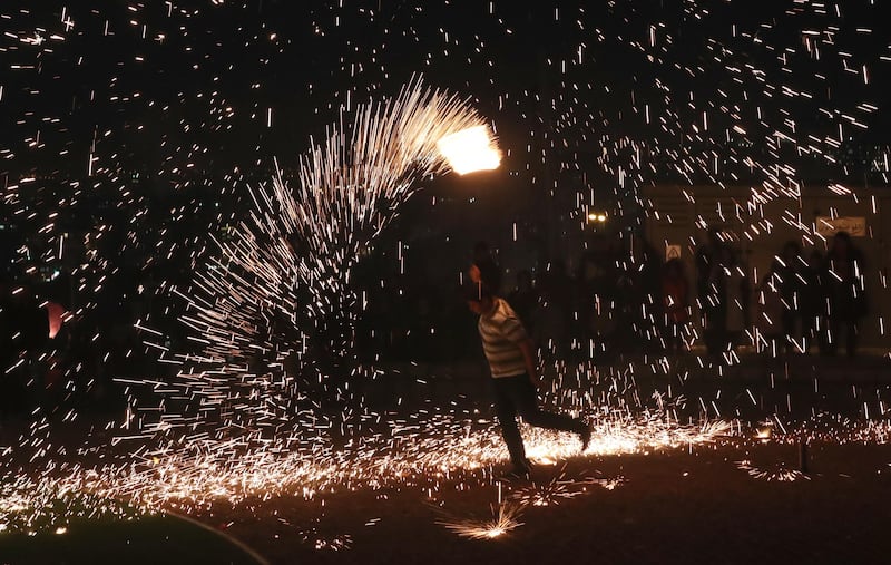Iranians take part in the traditional fire feasts (Charshanbeh Suri), in Tehran, Iran,  held on the last Wednesday eve before the Persian New Year (Nowruz) which starts on 21 March, and also marks the beginning of spring.  EPA