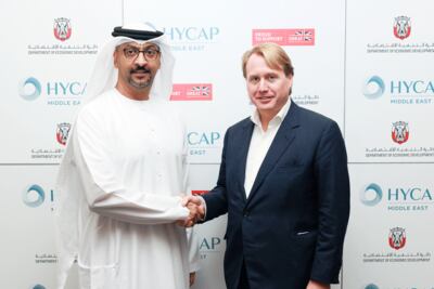 Arafat Al Yafei, executive director of the Added's Industrial Development Bureau and Jo Bamford, chairman and founding partner of Hycap Group. Photo: Added