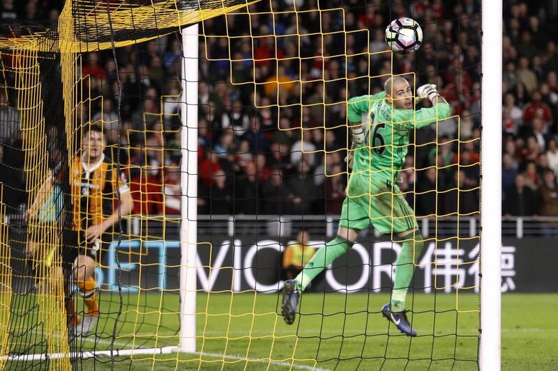 Hull City's Harry Maguire scores their fourth goal as Middlesbrough's Victor Valdes looks on. Hull won 4-2. Carl Recine / Reuters