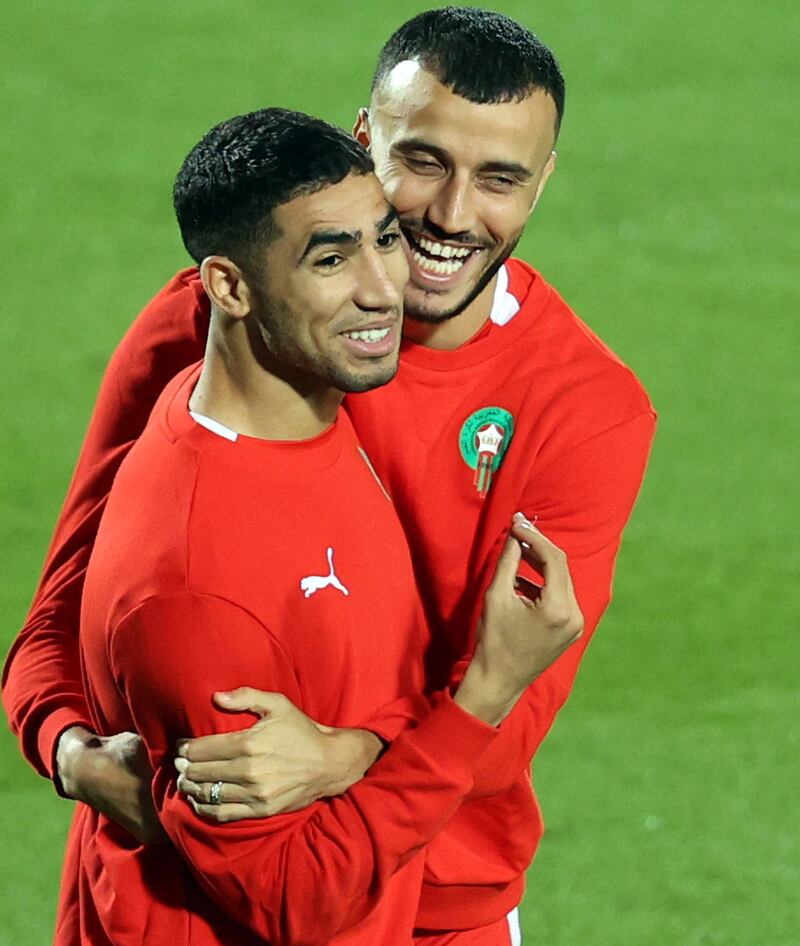 Achraf Hakimi, left, and Noussair Mazraouiduring Morocco's training session in Doha. EPA