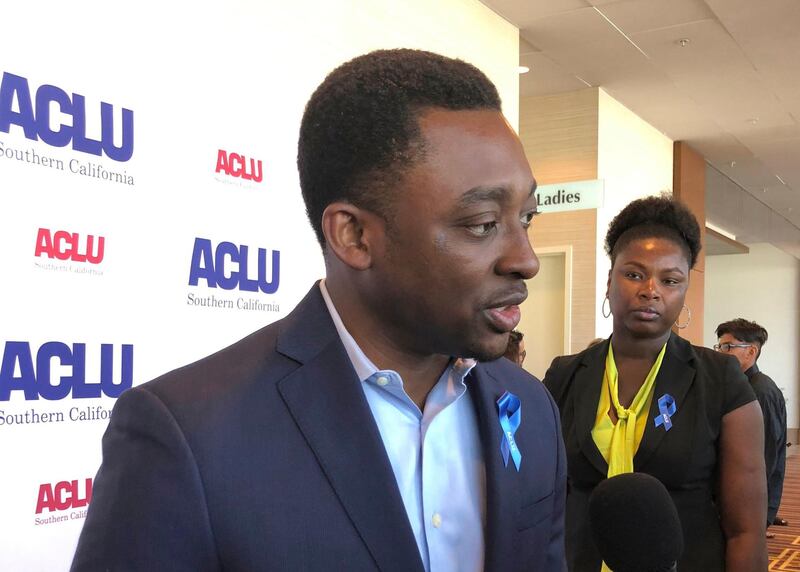 Actor Bambadjan Bamba speaks to media at the The ACLU Foundation of Southern California Annual Luncheon at the JW Marriott Hotel in downtown Los Angeles on June 8, 2018, where he  received the organization's Courageous Advocate Award.  On the hit US sitcom "The Good Place," Bambadjan Bamba plays an eternal being in the afterlife, but in reality he is living in limbo as an undocumented immigrant. The Ivorian actor, 36, is one of 700,000 "Dreamers" -- immigrants brought illegally to America as children who were protected by the Obama-era Deferred Action for Childhood Arrivals (DACA) program. / AFP / Frankie TAGGART
