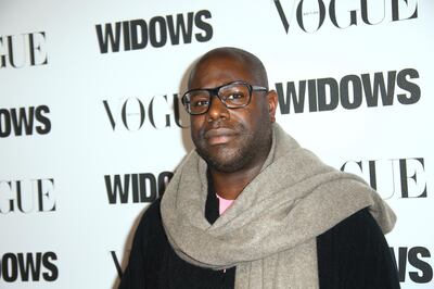 Director Steve McQueen poses for photographers upon arrival at the screening of the film 'Widows' in London Wednesday, Oct. 31, 2018. (Photo by Joel C Ryan/Invision/AP)