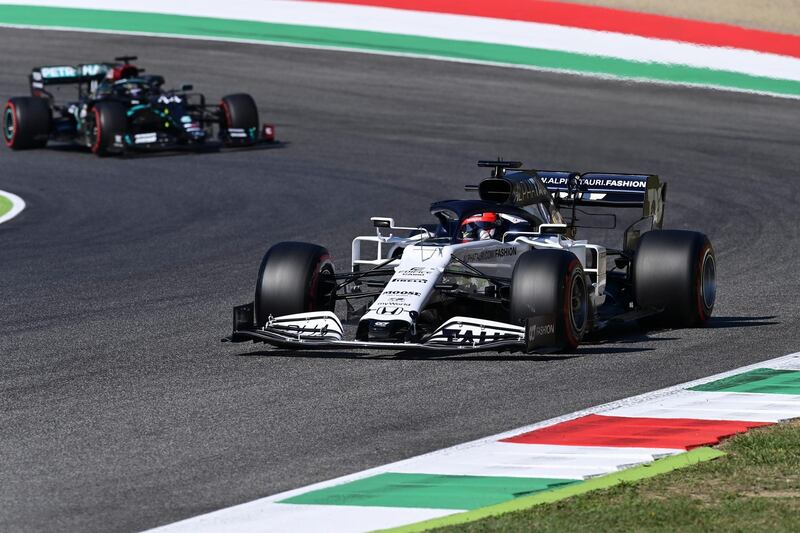 Daniil Kvyat of AlphaTauri, right, and Lewis Hamilton of Mercedes during qualifying. EPA