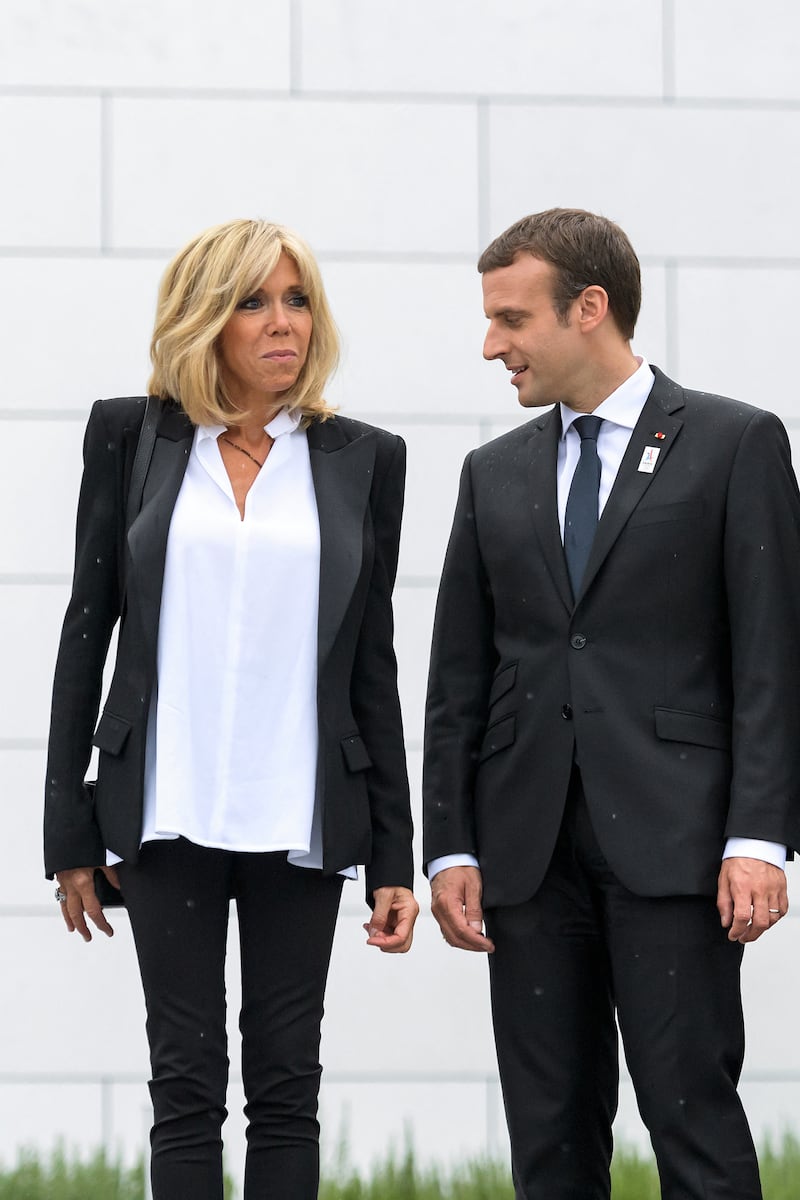 Brigitte, wearing a white shirt with a black blazer and trousers, visits Switzerland on July 10, 2017. AFP