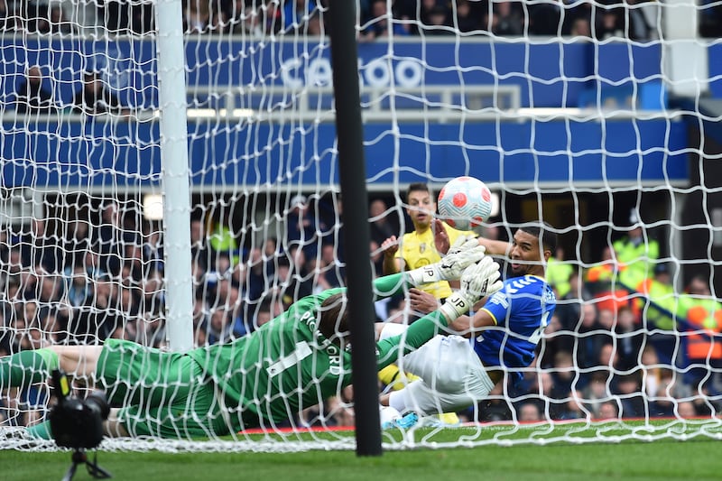 Everton goalkeeper Jordan Pickford makes a stunning save to deny Cesar Azpilicueta a certain goal for Chelsea. EPA