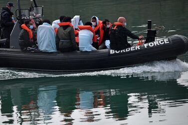 A Border Force boat packed with migrants picked up at sea in the English Channel. AFP/file