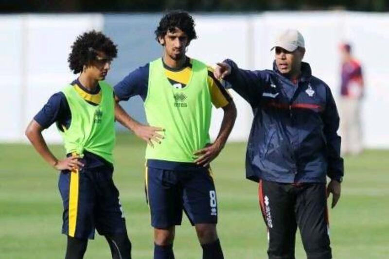 Mahdi Ali, right, has prepared his side, left, for the biggest competition the country has played in since the 1990 World Cup.
