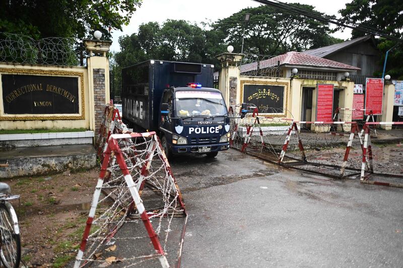 A police truck leaves Insein Prison. AFP