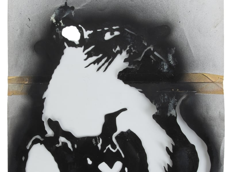 Banksy's original hand-cut paper stencil used to create his 'Toxic Rat' aerosol paintings that appeared in London in the mid-2000s. PA.