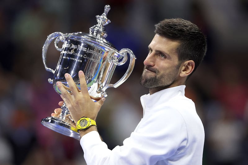 Novak Djokovic lifts the US Open trophy after defeating Daniil Medvedev in the final. AFP