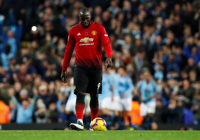 Manchester United's Romelu Lukaku looks dejected after Manchester City's third goal. Reuters