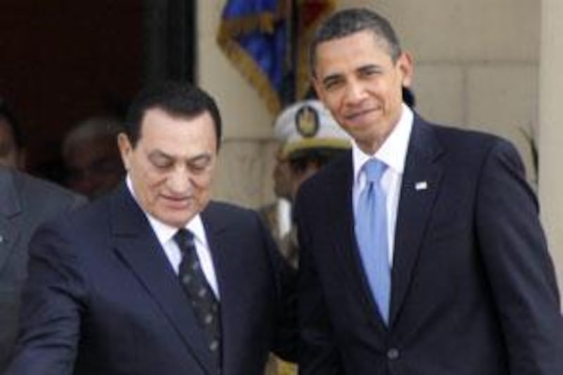 The Egyptian president Hosni Mubarak, left, welcomes US President Barack Obama upon his arrival at Qubba palace in Cairo Egypt on June 4, 2009.