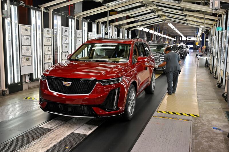 FILE PHOTO: Final inspection is performed as the vehicles are ready to leave the assembly line at the General Motors (GM) manufacturing plant in Spring Hill, Tennessee, U.S. Picture taken August 22, 2019.  REUTERS/Harrison McClary/File Photo