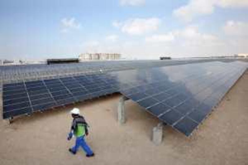 ABU DHABI. 13th Jan.2009. Lines of solar panels at the photovoltaic electricity plant under construction  at the Masdar City development in Abu Dhabi. Stephen Lock  /  The National.  *** Local Caption ***  SL-masdar-005.jpg