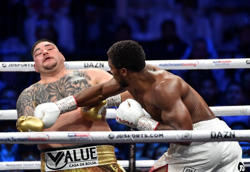 Joshua lands a right in his fight with Andy Ruiz Jr. AFP