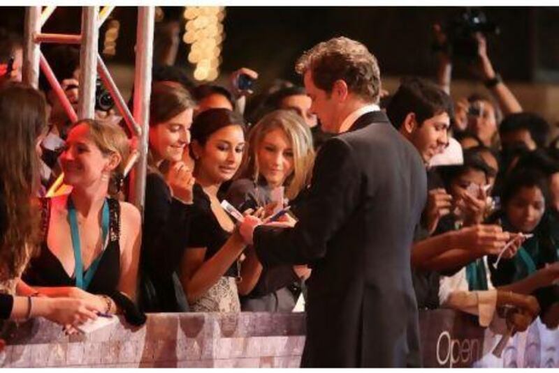The actor Colin Firth with fans on DIFF opening night at the Madinat Arena. As well as plenty of Hollywood glamour, there are 70 Arab films showing in the festival this year.