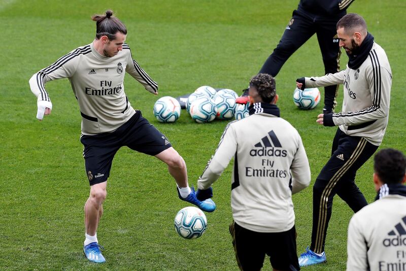 Gareth Bale (L) and Karim Benzema (R) at training