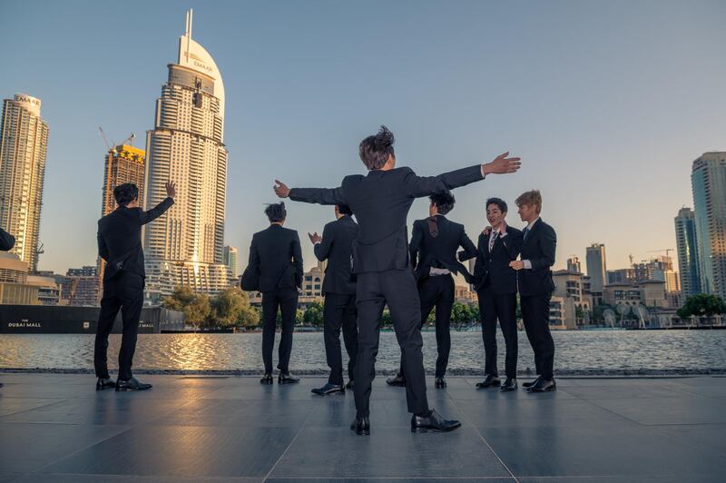 Members of Exo greet their fans from the other side of the Dubai Fountain. Courtesy Dubai Tourism